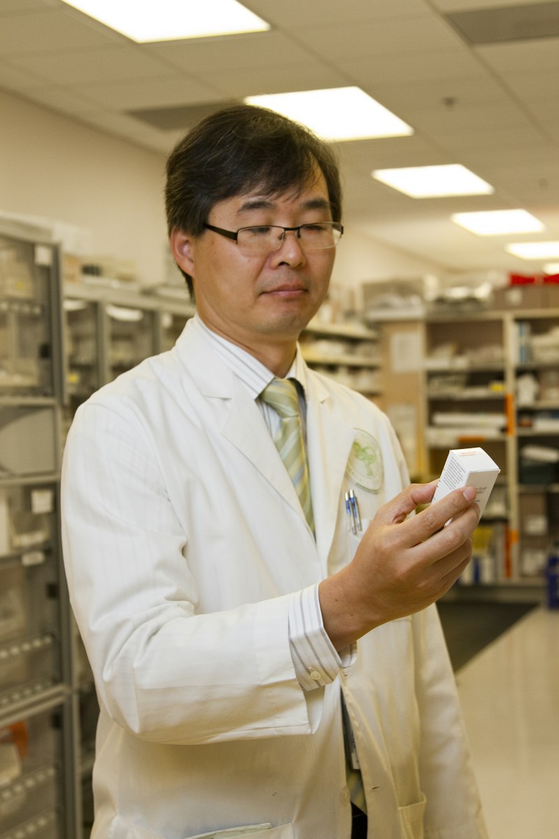 An optometrist performing a comprehensive eye examination using modern diagnostic equipment