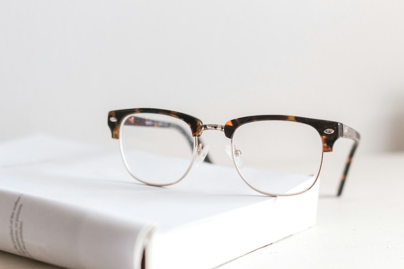 Various types of corrective eyeglasses and contact lenses for refractive error correction